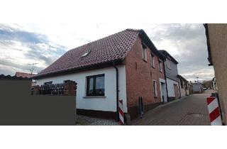 Mehrfamilienhaus kaufen in 06333 Hettstedt, Hettstedt - Reihenendhaus 2 Wohnungen Doppel-Garage Büro Werkstatt Terasse