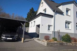 Doppelhaushälfte kaufen in 57518 Betzdorf, Betzdorf - Umfangreich modernisierte, hochwertige Doppelhaushälfte mit Carport, traumhaftem Garten & Teich