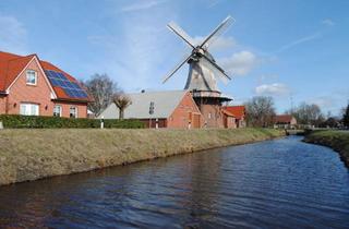 Doppelhaushälfte kaufen in 26802 Moormerland, Moormerland - Attraktive Doppelhaushälfte in idyllischer Lage am Sauteler Kanal