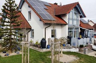 Einfamilienhaus kaufen in 97440 Werneck, Modernes Einfamilienhaus mit Garage und liebevoll gestalteter Gartenlandschaft