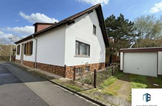Einfamilienhaus kaufen in 55571 Odernheim, Freistehendes Einfamilienhaus mit Garage, Carport und Garten in Odernheim am Glan