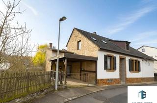 Einfamilienhaus kaufen in 55571 Odernheim, Freistehendes Einfamilienhaus mit Garage, Carport und Garten in Odernheim am Glan