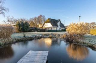 Haus kaufen in 25797 Wöhrden, Reetgedecktes Friesenhaus in Nordseenähe