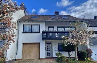 Reihenhaus kaufen in 42111 Wuppertal, Gemütliches Reihenhaus mit Einliegerbereich und Garage in verkehrsberuhigter Sackgasse