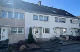 Reihenhaus kaufen in 59557 Lippstadt, Attraktives Reihenhaus mit Garage, Garten und großem Entwicklungspotenzial