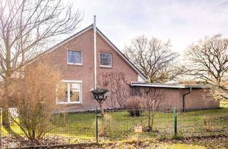 Doppelhaushälfte kaufen in 25436 Tornesch, Komfortable Doppelhaushälfte mit Baugrundstück