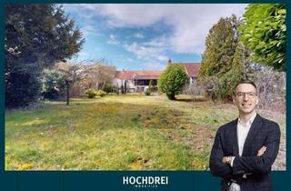 Haus kaufen in 55218 Ingelheim, Sonniges Baugrundstück mit Dreifamilienhaus und charmanter Werkstatt zum Kauf in Nieder-Ingelheim