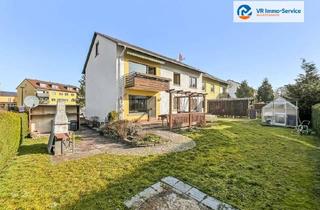 Haus kaufen in 97318 Kitzingen, Ein Haus, viele Möglichkeiten – Zweifamilienhaus mit Garten