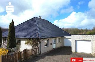 Haus kaufen in 26842 Ostrhauderfehn, Besonderer Bungalow mit viel Platz und zwei großen Garagen