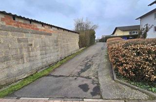 Anlageobjekt in 35418 Buseck, Natur trifft Nutzen: Großes Gartengrundstück inklusive Halle mit asphaltierter Zufahrt