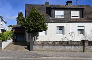 Doppelhaushälfte kaufen in 42549 Velbert, Doppelhaushälfte mit großem Garten und Garage in Velbert-Losenburg – ideal für Familien mit Kindern und/oder Hund!