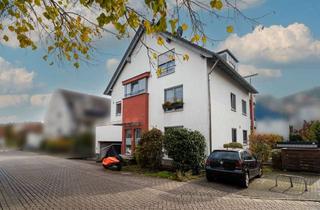Wohnung kaufen in 64625 Bensheim, Moderne 4-Zimmer-Gartenwohnung mit Garten & Garagen-Stellplätzen