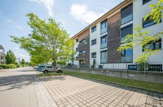Wohnung kaufen in 85757 Karlsfeld, Bezugsfrei und energiesparend! Moderne, schwellenarme Gartenwohnung mit zwei Bädern u. Stellplätzen