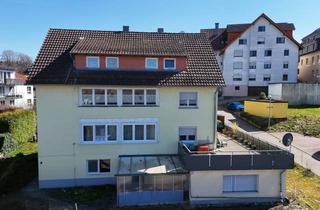 Wohnung kaufen in 75328 Schömberg, Sanierungsobjekt mit Potenzial: 4-Zimmer-Wohnung mit Garten & Wintergarten