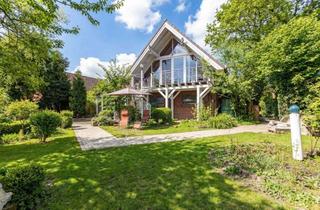 Einfamilienhaus kaufen in 26736 Krummhörn, Großzügiges Mehrgenerationenhaus + Einliegerwohnung in direkter Wasserlage mit parkähnlichem Gart...