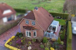 Einfamilienhaus kaufen in 26802 Moormerland, Charmantes und gepflegtes Familienhaus in zentraler Lage von Veenhusen!