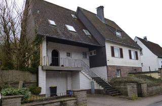 Haus kaufen in 37603 Holzminden, Holzminden - Wohnhaus mit Garage und Garten im Hochsolling