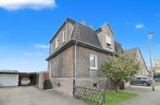Haus kaufen in 59077 Hamm, Hamm - Freistehendes Zweifamilienhaus mit großem Garten in Hamm-Herringen