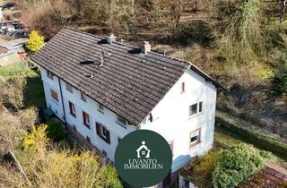 Haus kaufen in 67468 Frankenstein, SANIERUNGSOBJEKT MIT POTENZIAL - DHH inkl. umfangreichem Grundstückspaket