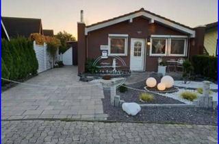 Haus kaufen in 26969 Butjadingen, Ihr Logenplatz an der Nordsee: Charmantes Domizil mit Wintergarten & Top-Rendite