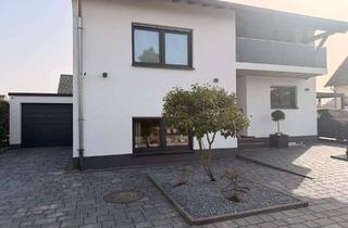 Einfamilienhaus kaufen in 53913 Swisttal, Modernes freistehendes Einfamilienhaus mit Galerie und Bad en Suite