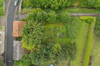 Immobilie kaufen in 61200 Wölfersheim, Attraktives Baugrundstück, 855 m², mitten in Wölfersheim-Berstadt mit kleinem Wohnhaus im Bestand