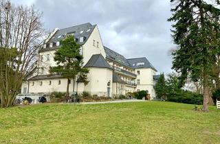 Wohnung kaufen in 12683 Berlin, Berlin - Wohnen mit Stil und Geschichte - Großzügige 3-Zimmer-DG-Wohnung im Baudenkmal von Berlin-Biesdorf