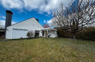 Haus kaufen in 38108 Braunschweig, Braunschweig - Bungalow mit 1186 m² Traumgrundstück - viel Platz und Ruhe