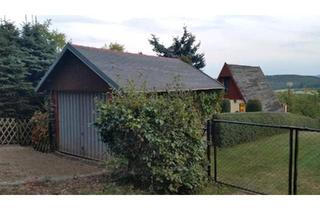 Wohnung kaufen in 06636 Laucha, Laucha an der Unstrut - Wochenendgrundstück, Eigentum, mit Finnhütte u. Garage, Südhang