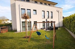 Wohnung kaufen in 61440 Oberursel, Exklusive 3-Zimmer Erdgeschosswohnung mit Garten in Oberursel (Taunus)