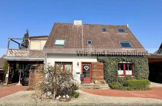Haus kaufen in 49176 Hilter, Zwei Wohneinheiten und Praxisräume im Anbau