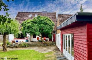 Haus kaufen in 49176 Hilter, Zwei Wohneinheiten und Praxisräume im Anbau