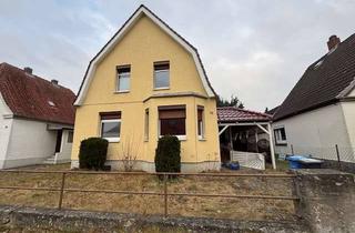 Einfamilienhaus kaufen in Am Neuen Kamp 52, 24537 Gartenstadt, Charmantes Einfamilienhaus in Toplage mit modernisierter Gebäudehülle auf 113 m² Wohnfläche
