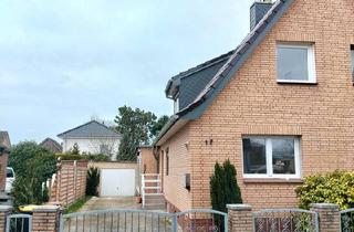 Doppelhaushälfte kaufen in 25436 Uetersen, Uetersen - Renovierte Doppelhaushälfte mit Garage in Uetersen