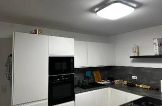 Wohnung kaufen in 33649 Ummeln, Gütersloh - Souterrainwohnung mit Garage und Wintergarten