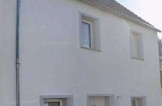 Haus kaufen in 56479 Hellenhahn-Schellenberg, Hellenhahn-Schellenberg - Zweifamilienhaus mit zusätzlichen Grundstück