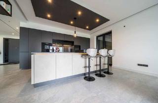 Wohnung kaufen in 35274 Kirchhain, Kirchhain - Moderne Erdgeschosswohnung mit unverbaubarem Blick