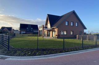 Wohnung mieten in Irma-Cornelßen-Straße 19, 26434 Wangerland, Moderne EG-Neubauwohnung mit Garten, Terrasse & hochwertiger Einbauküche in Hooksiel