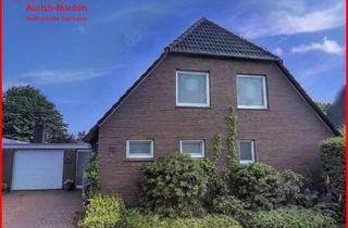 Einfamilienhaus kaufen in 26553 Dornum, Einfamilienhaus auf großem Grundstück mit Blick über Wiesen und Felder in Dornum