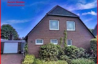 Einfamilienhaus kaufen in 26553 Dornum, Einfamilienhaus auf großem Grundstück mit Blick über Wiesen und Felder in Dornum