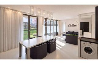 Wohnung kaufen in Liebigstraße 1D, 10247 Friedrichshain, 3-Zimmer-Designwohnung mit TG-Stellplatz, Südterrasse & 90 m² Garten in prämiertem Neubauensemble