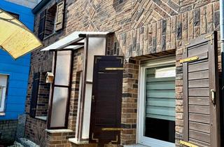 Reihenhaus kaufen in Klinkheiderstraße, 52134 Herzogenrath, Charmantes kleines Haus mit gemütlichem Hof und Garten