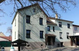 Anlageobjekt in 04910 Elsterwerda, Gepflegtes MFH mit drei Wohneinheiten, großem Grundstück und vielseitigem Nebengelass