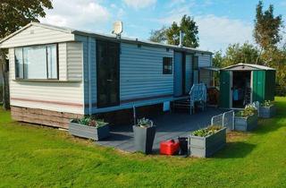 Wohnung kaufen in 44866 Bochum, Bochum - Wunderschönes Mobilheim am Wasser mit Boots-Liegeplatz