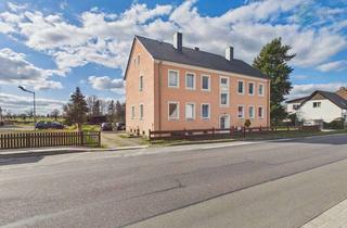Mehrfamilienhaus kaufen in 04934 Hohenleipisch, Kapitalanlage mit Luft nach oben: Modernisiertes MFH mit 4 Einheiten, Garagen und Ausbaupotenzial