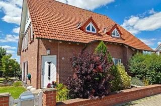 Doppelhaushälfte kaufen in Ferdinand-Lentjes-Straße, 39167 Wellen, Doppelhaushälfte mit 5 Zimmern, Kamin und Garten in Wellen mit Energieeffizienzklasse C