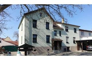 Haus kaufen in 04910 Elsterwerda, Gepflegtes MFH mit drei Wohneinheiten, großem Grundstück und vielseitigem Nebengelass