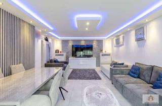 Wohnung kaufen in 42553 Velbert, Sanierte 3-Zimmer-Wohnung mit Garage und Balkon