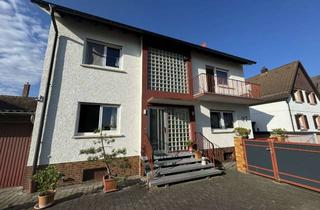 Einfamilienhaus kaufen in 68642 Bürstadt, Einziehen oder vermieten · Einfamilienhaus mit Garten, zwei Garagen und sofortigem Ertrag