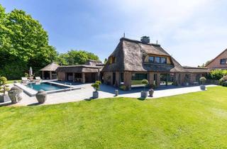 Villa kaufen in 24582 Mühbrook, Reetdach-Villa in bester Lage – exklusives & luxuriöses Wohnen mit unverbaubarem Blick auf den See